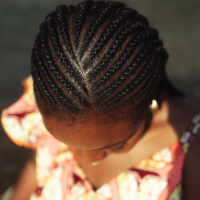 Nattes collées (Cornrows) : le secret de beauté africain entre art, protection et héritage